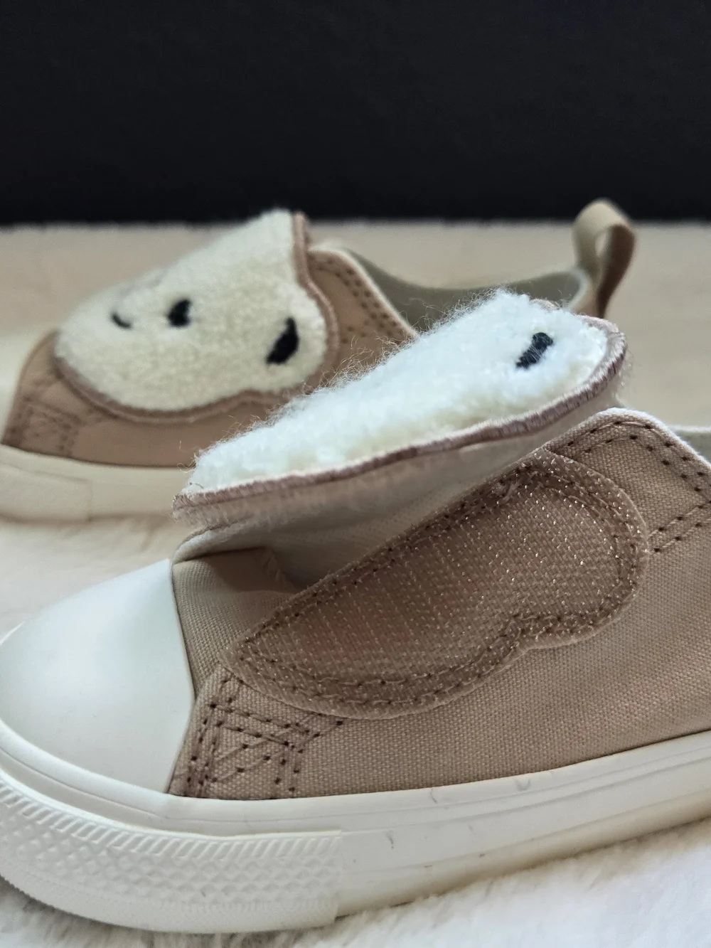 Converse Kids Beige Slip-On Sneakers with White Fuzzy Bear Accent